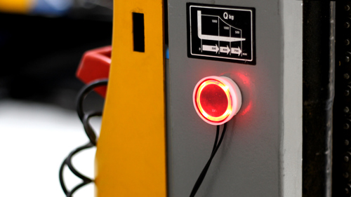 low voltage alert flashes red on forklift truck