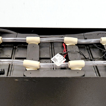 A Flame Arrested Water Injector System installed on a lead acid battery